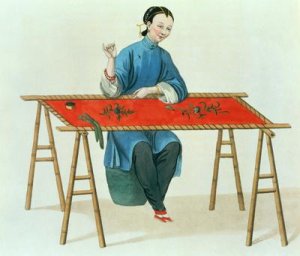A Woman Embroidering